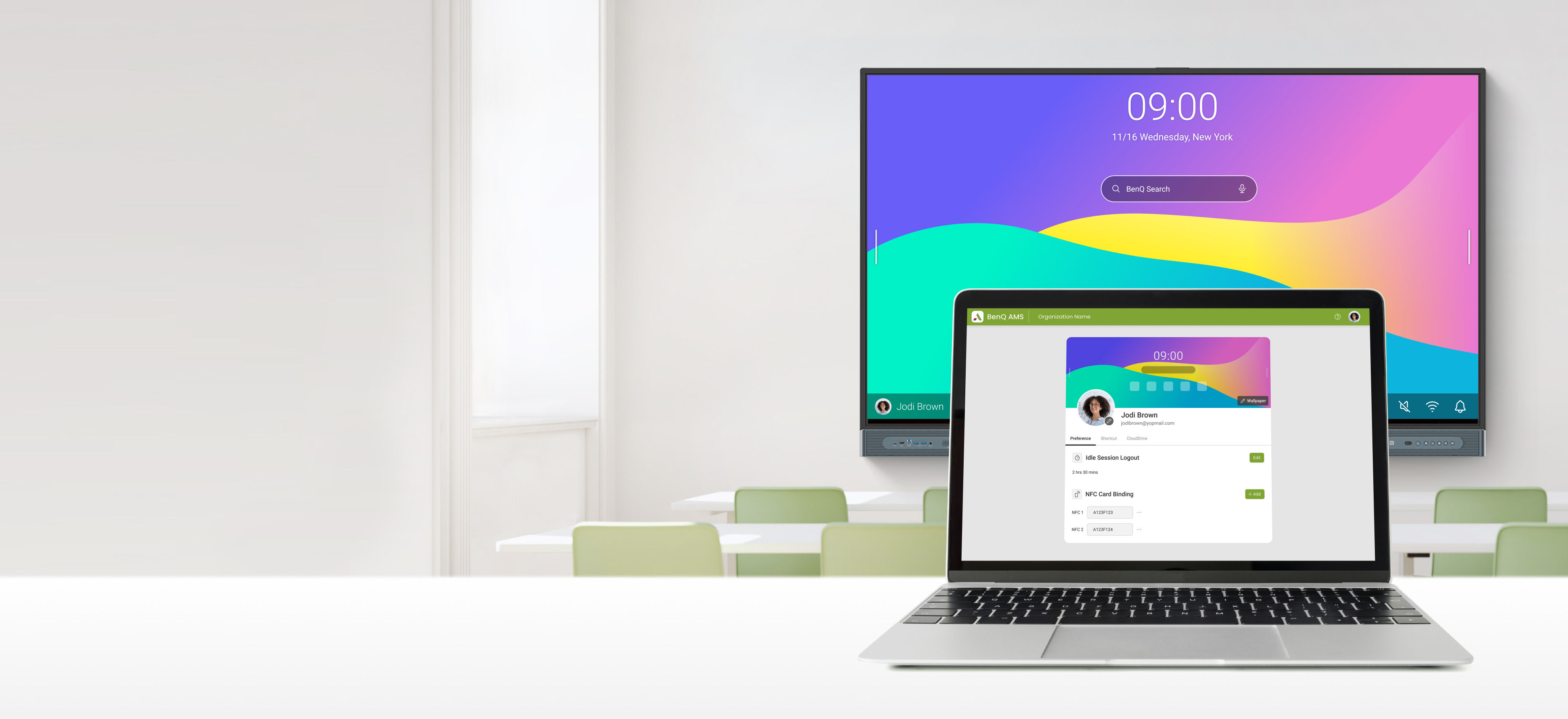 Account Management System open on laptop in front of interactive display in classroom