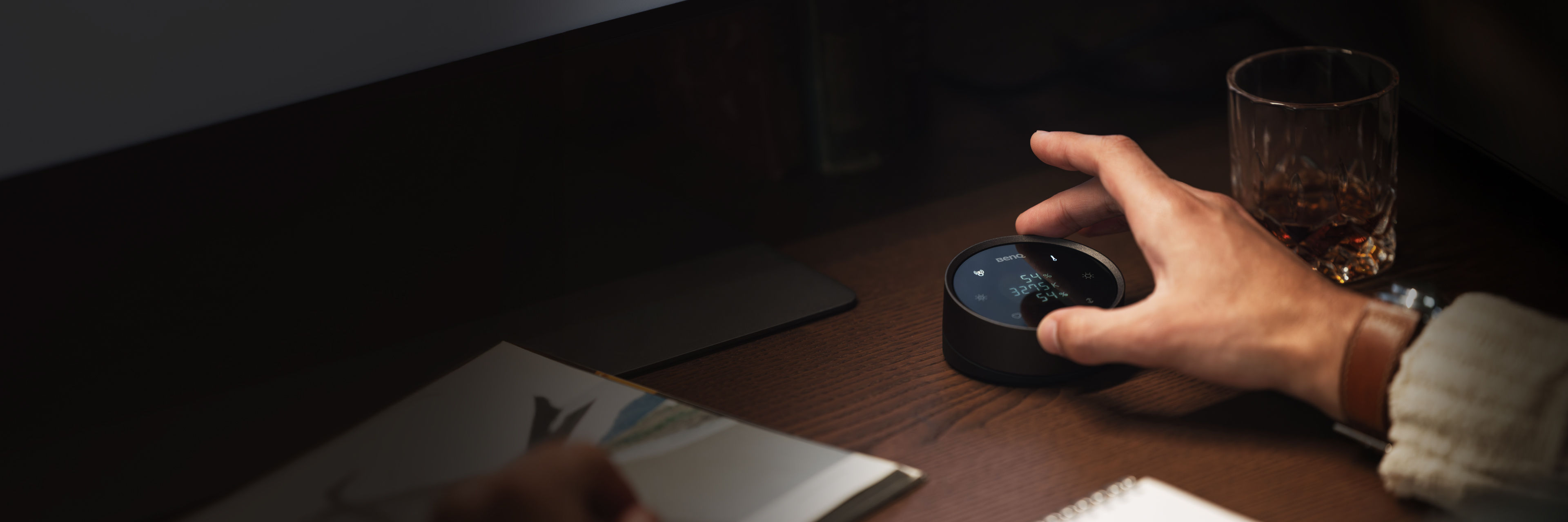 Award-winning monitor light bar crafted with form-follows-function design, featuring a patented clamp and premium finishing.