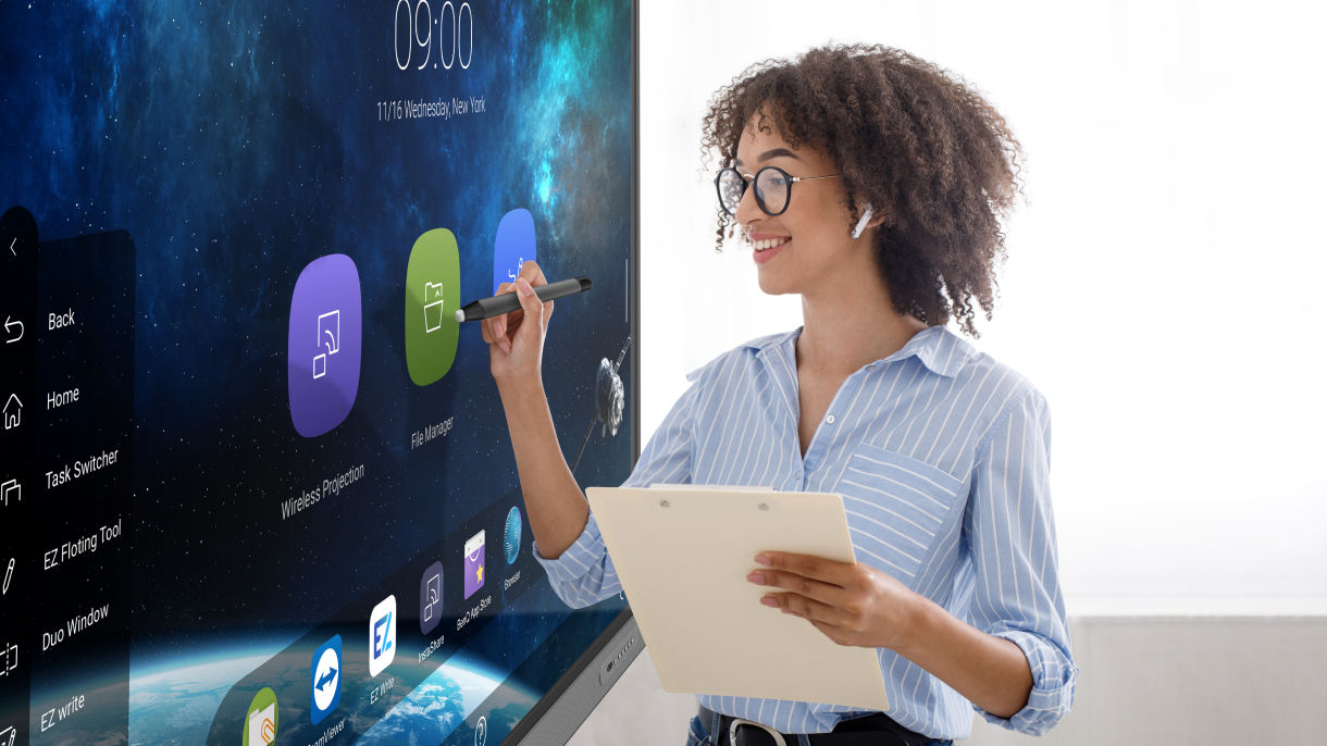 Teacher using Uni UI user interface on a BenQ Board interactive display