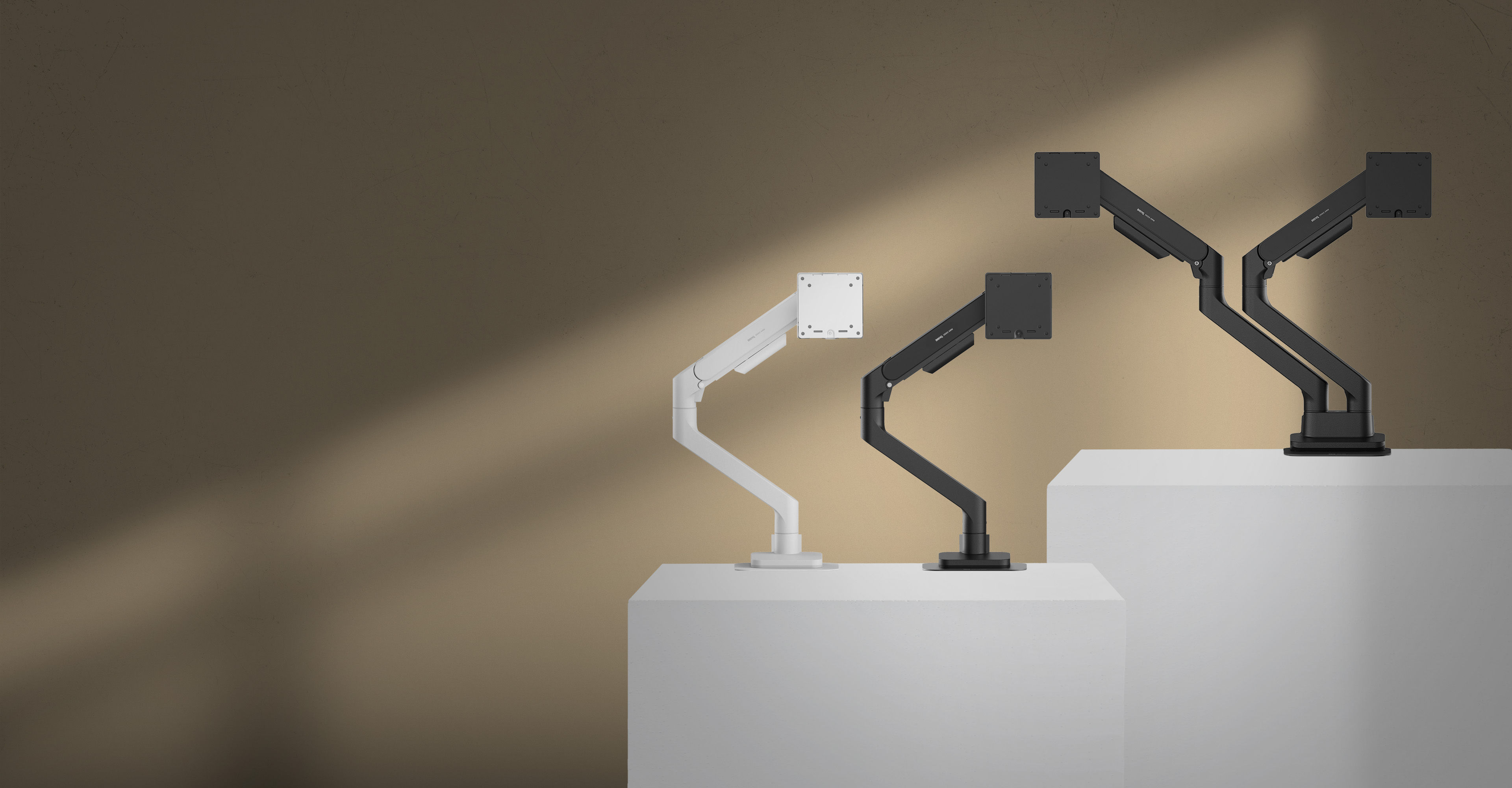 Heavy duty monitor arm - BenQ Ergo Arm with VESA mount and reinforcement plate supporting monitor, webcam, and light bar for stable ergonomic positioning