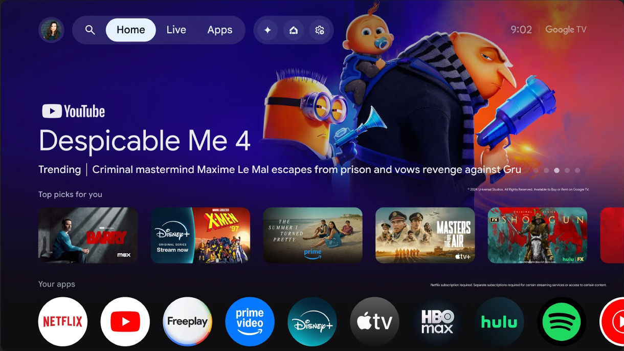 Google TV home screen on a BenQ home projector, showing movies and streaming apps including Netflix and YouTube.