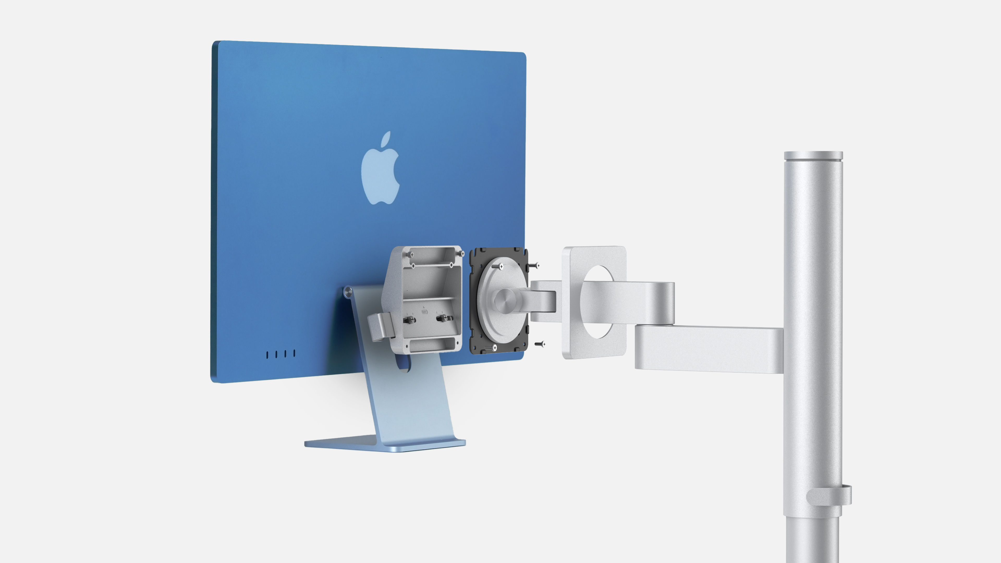 Exploded view of Stand Clip attaching to iMac's original stand, with Studio Arm aligned for mounting.
