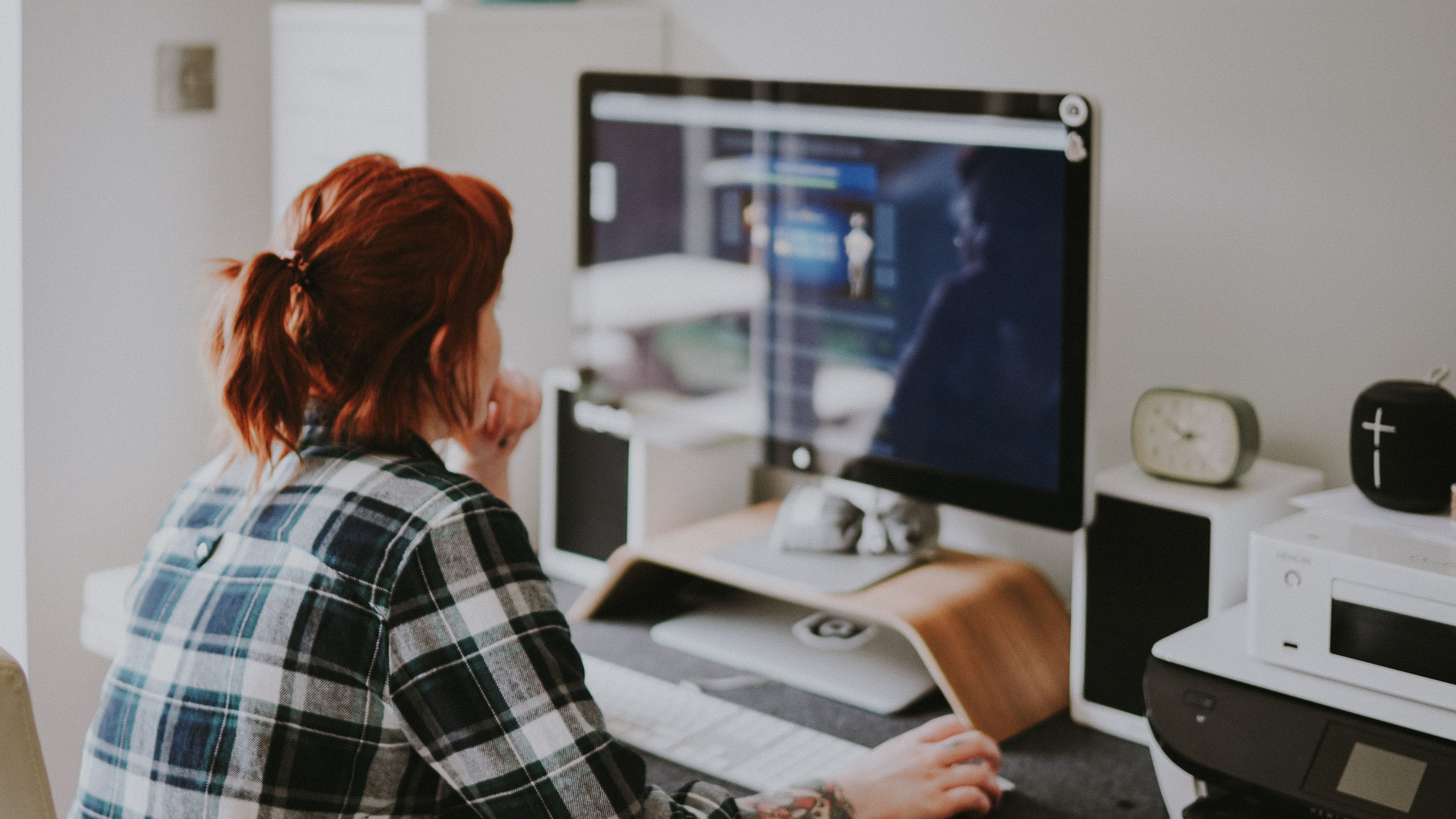 girl staring at the monitor