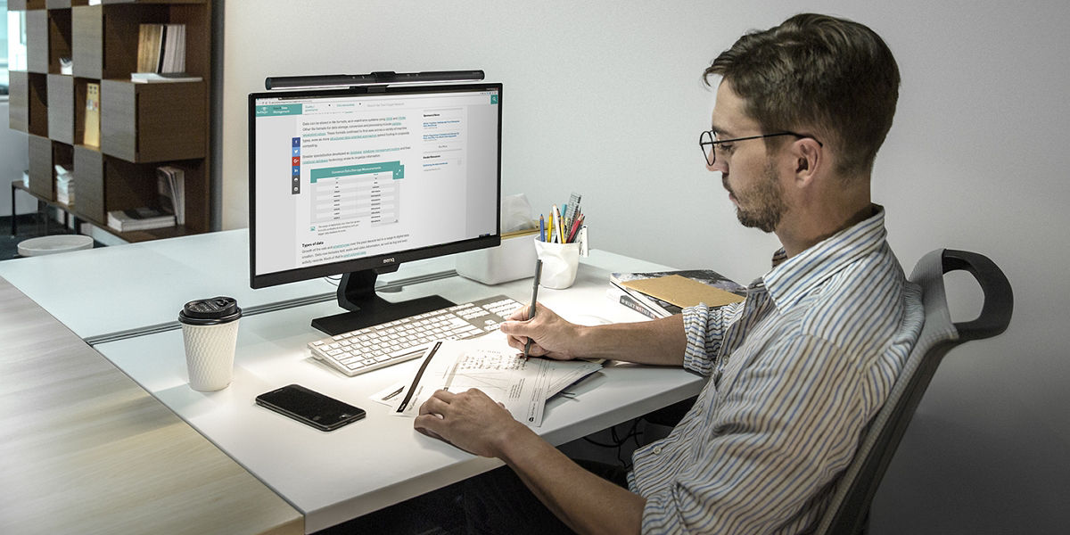 Screenbar LED lamp attached on a monitor screen for the office man