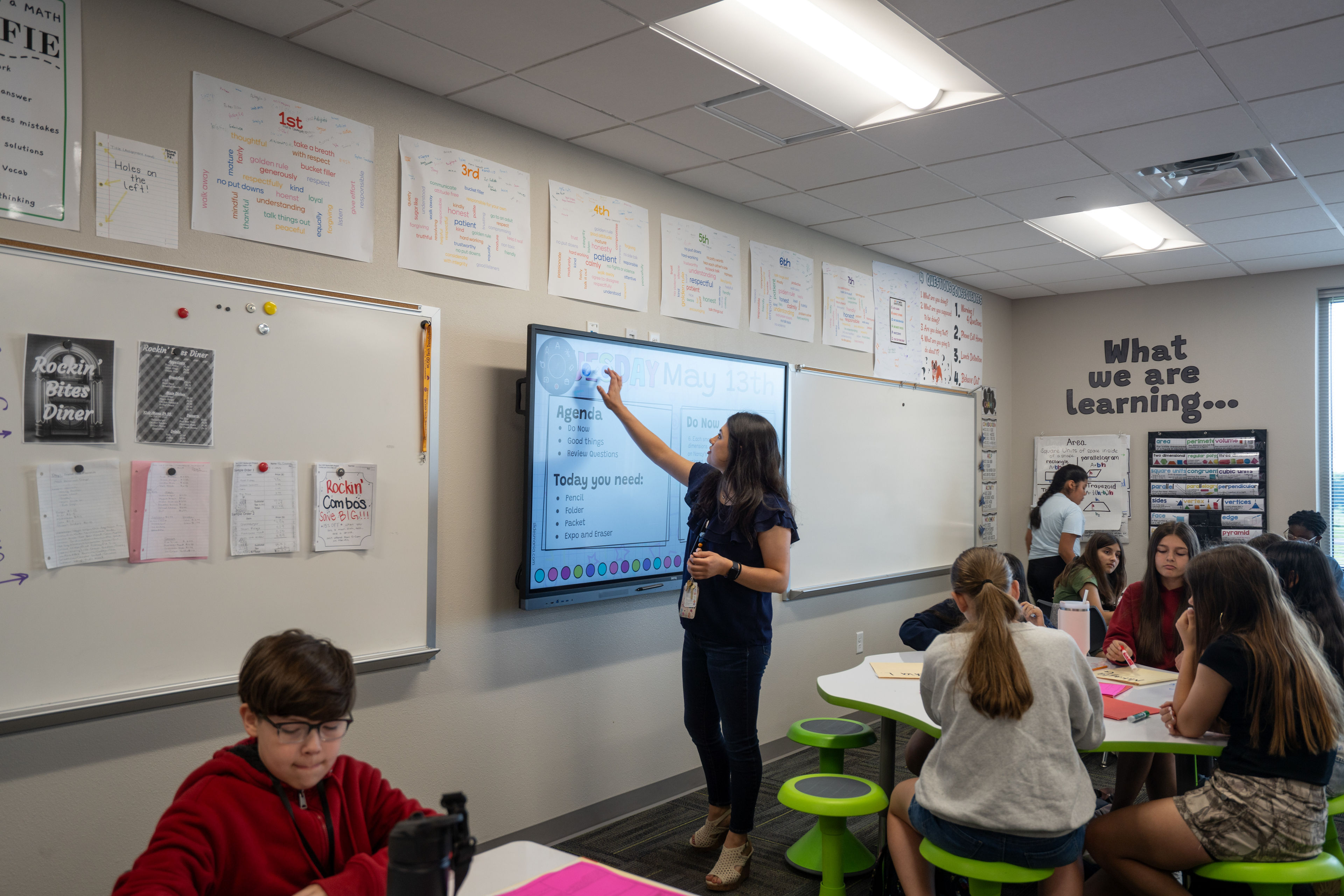Teacher using BenQ RM04 Interactive Board in Royse City ISD classroom