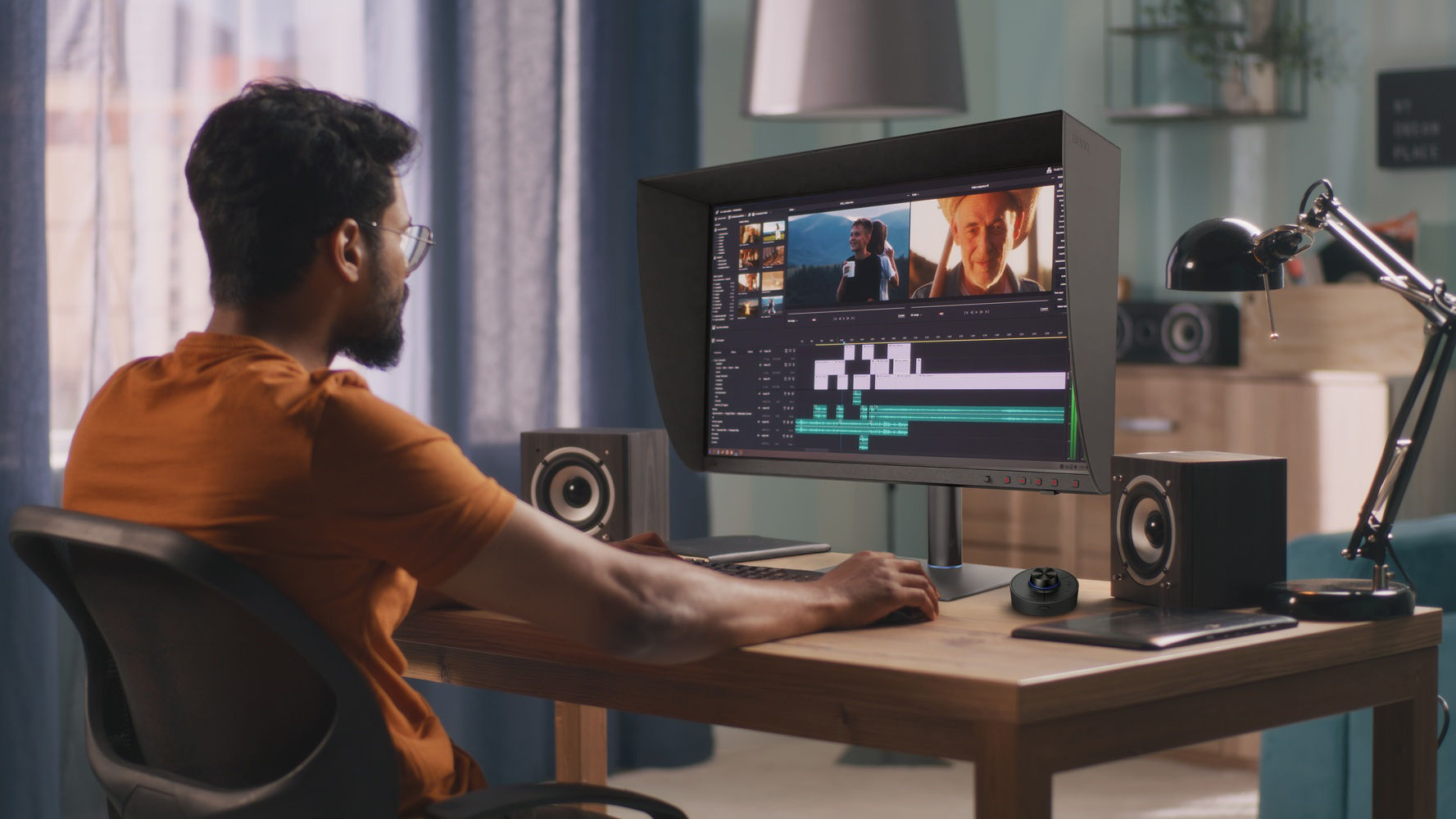 Man editing video on computer