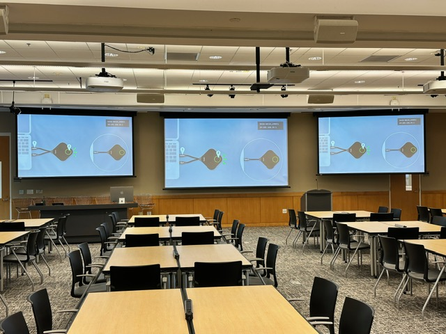 Large interactive flat panel display paired with BenQ InstaShow for seamless presentations