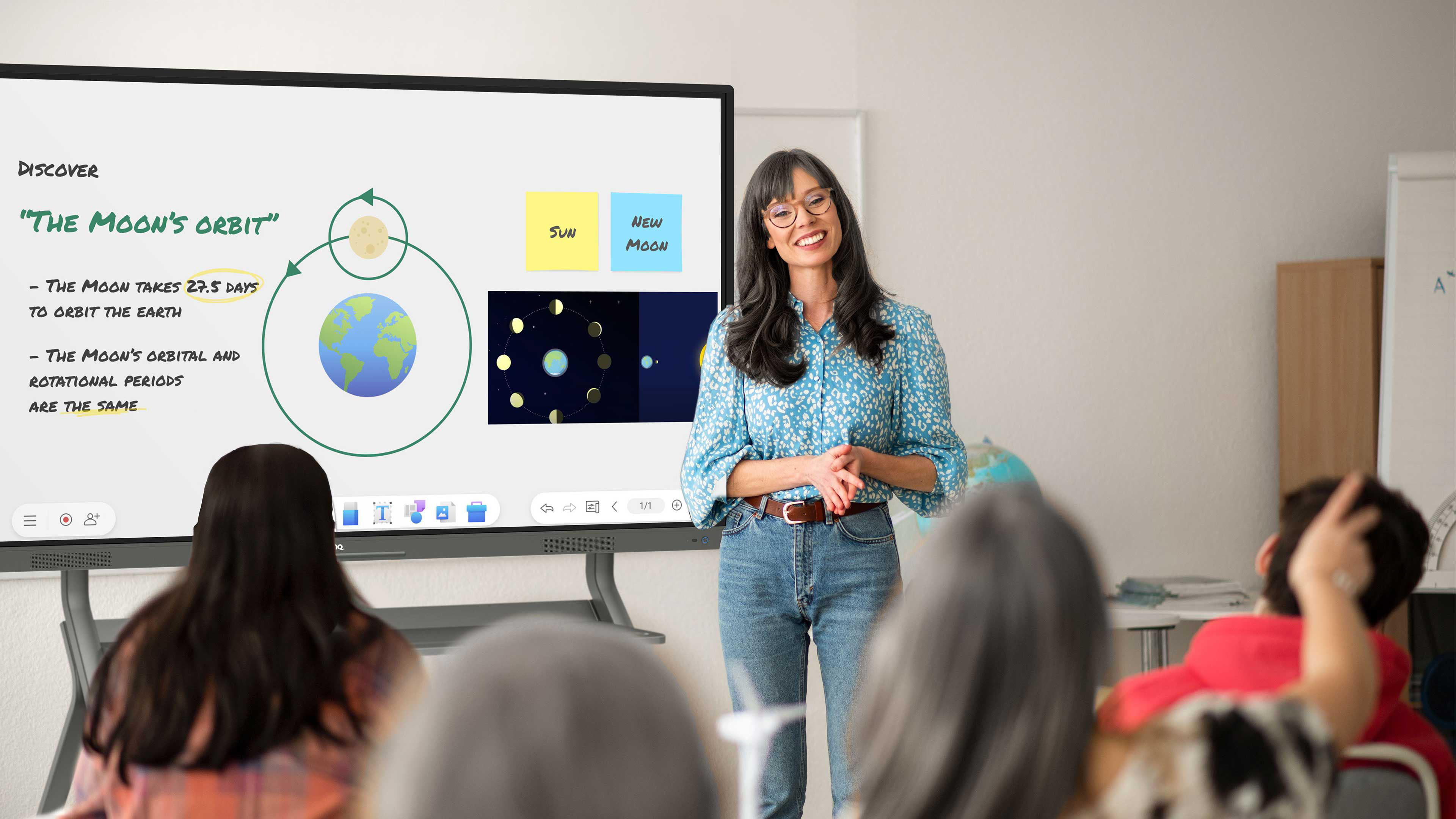 Teacher discussing space shuttles on a BenQ Board