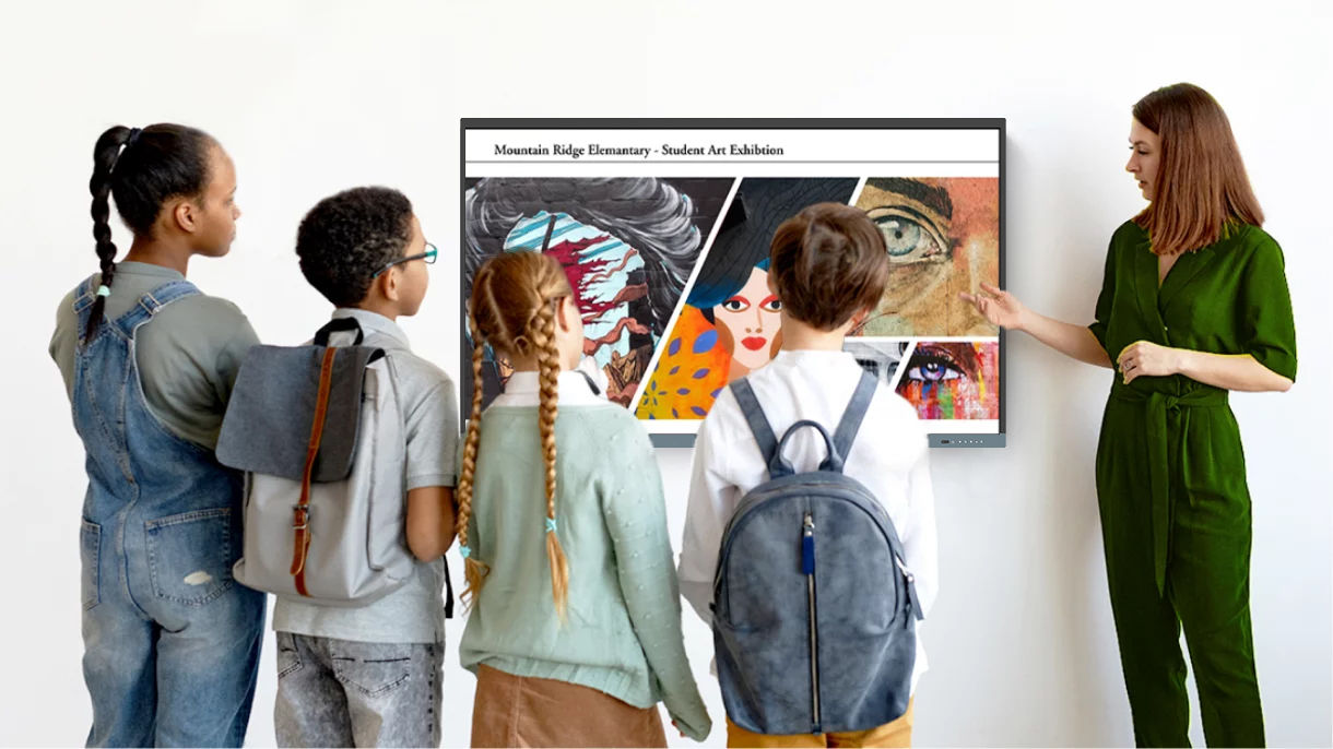 Teacher showing students an art exhibition on a BenQ display using digital signage software