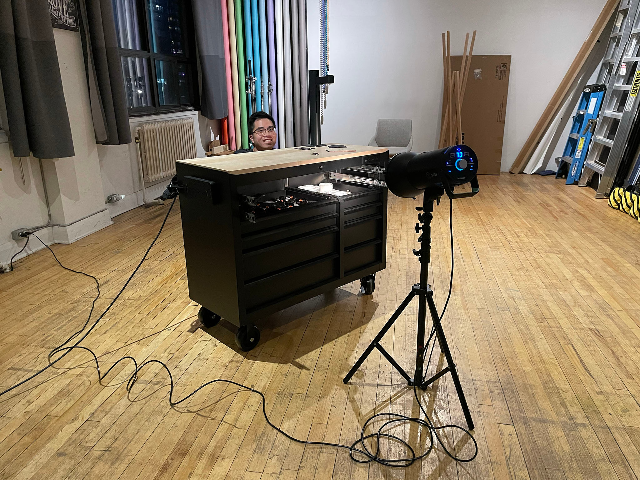 Martin (Giancarlo's assistant) drilled four holes to install the monitor arm.