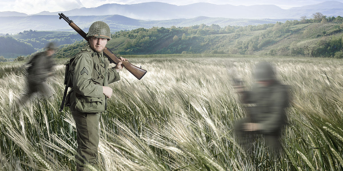 Soldiers walking in the bush in disguise in the style of Terrence Malick's Red Thin Line 