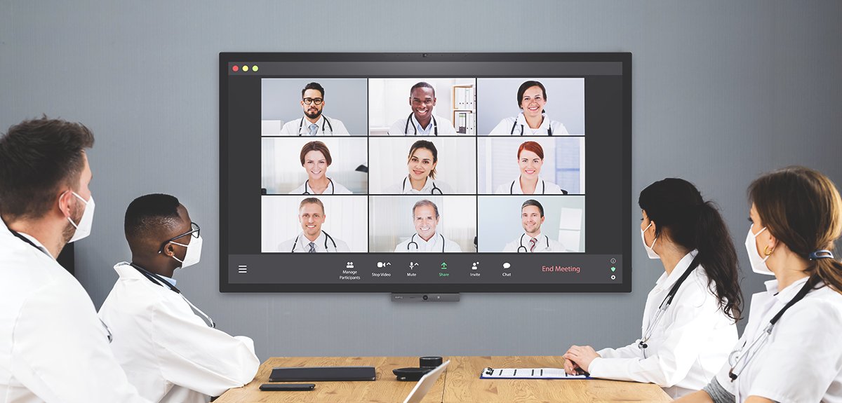 Hybrid video conferencing in healthcare with BenQ DuoBoard interactive smart board.