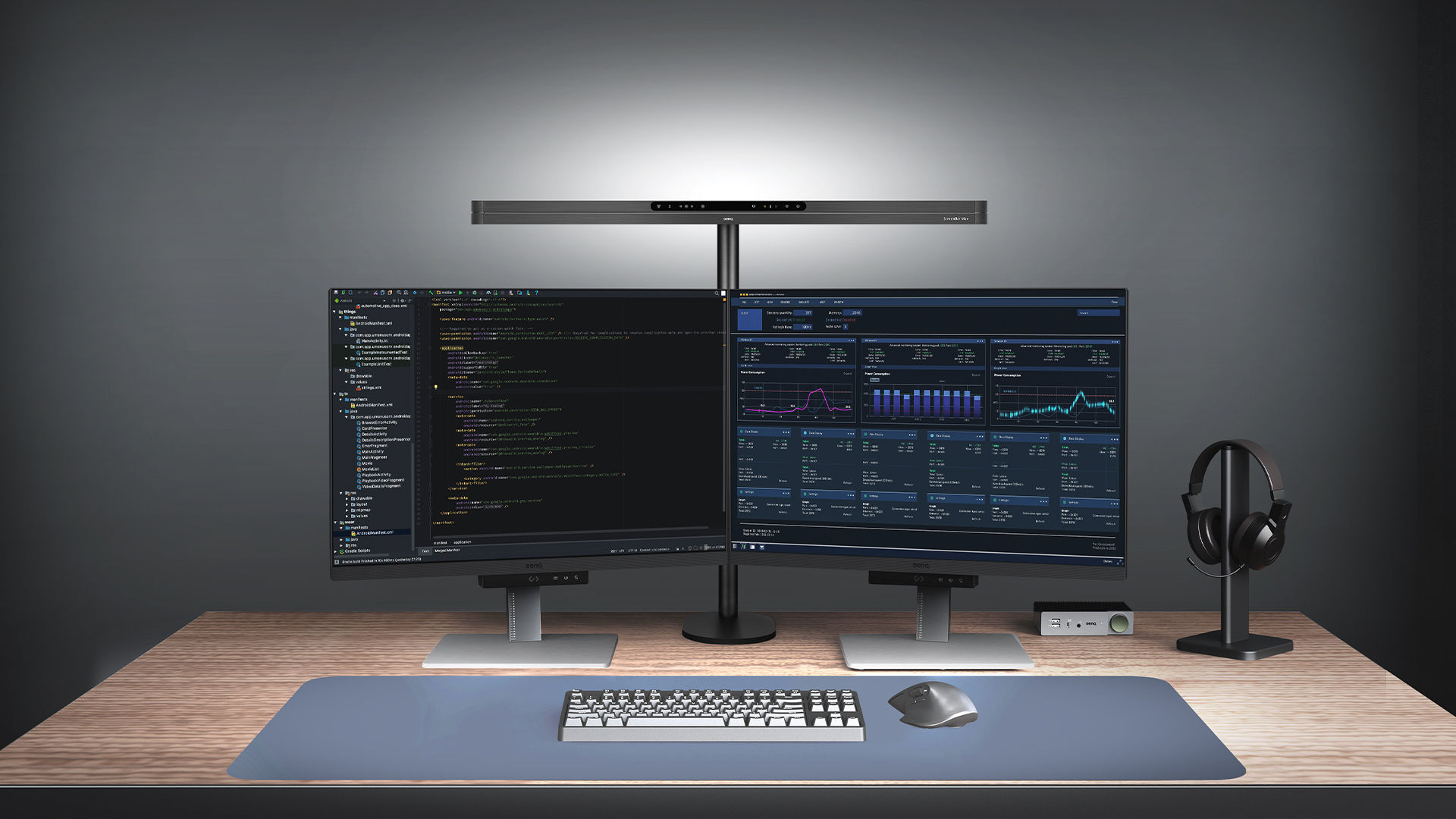 BenQ ScreenBar Max dual monitor desk lamp installed with the optional Base Stand on a dual monitor workspace