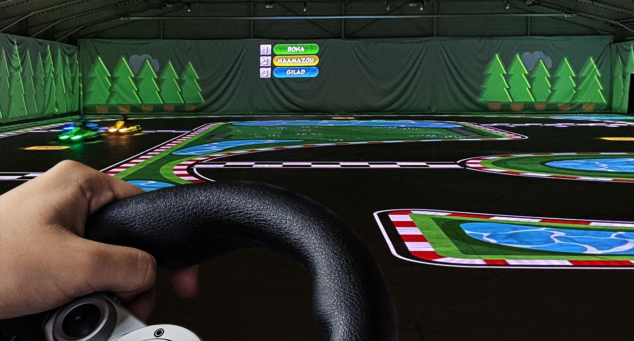 Battle Kart uses dozens of blended BenQ short throw projectors to create a virtual indoor racing track.