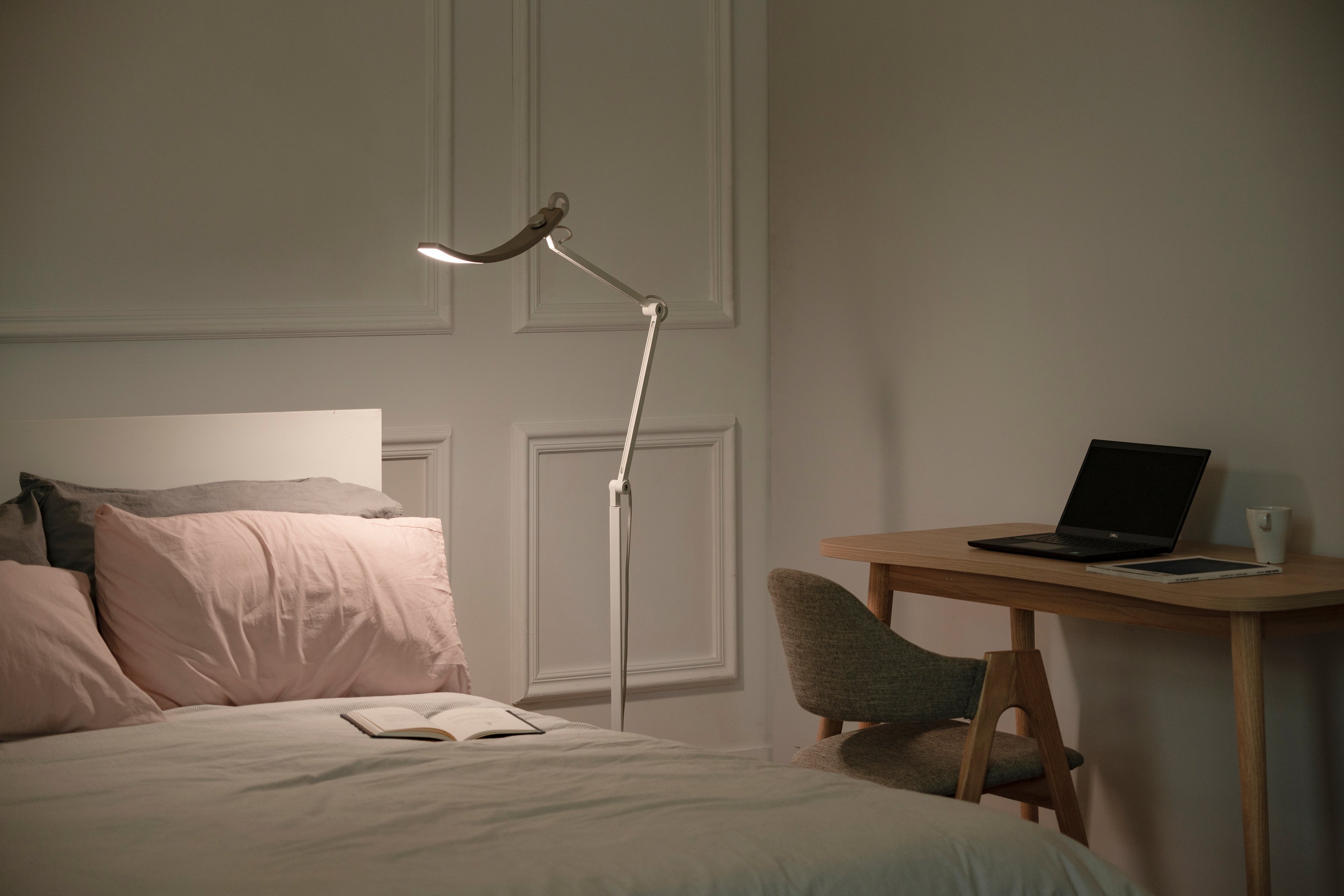 floor lamp for bedside reading with a desk  on right hand side