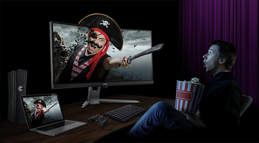The man who enjoys pilot movie is amazed by the outstanding monitor screen quality with HDR technology.