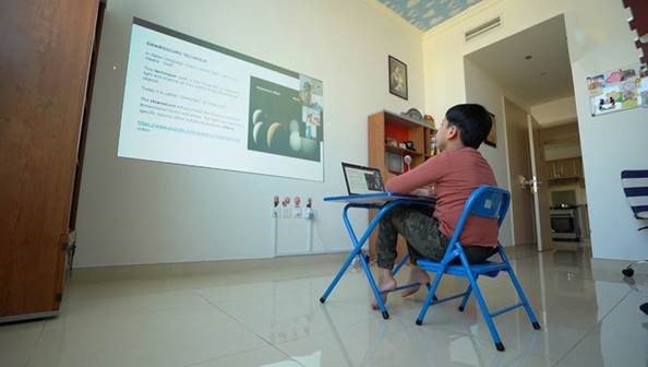 Smart projector used at home for remote education