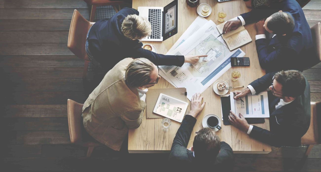 A group of colleagues from a marketing team having a business meeting