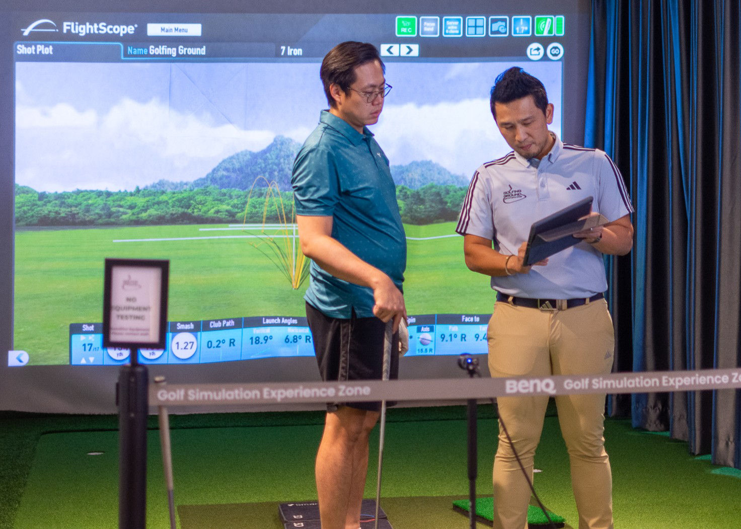 golfing ground performance center director coaching in BenQ experience golf simulation zone