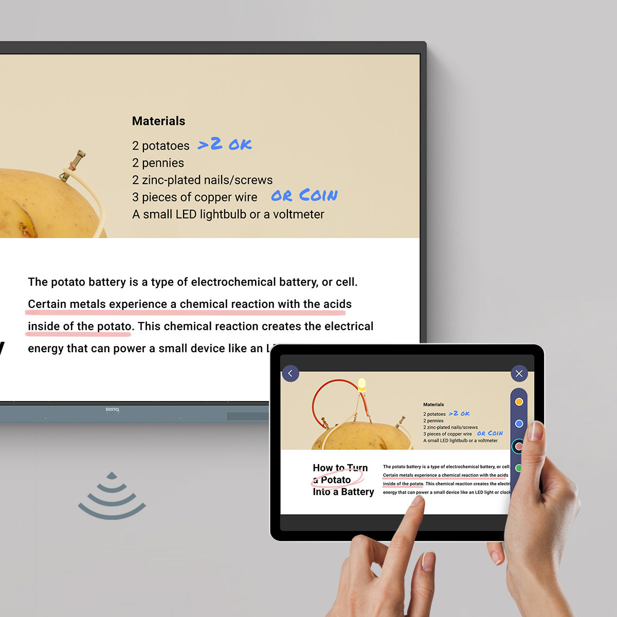 Student writing on tablet and sharing screen to display at the front of class
