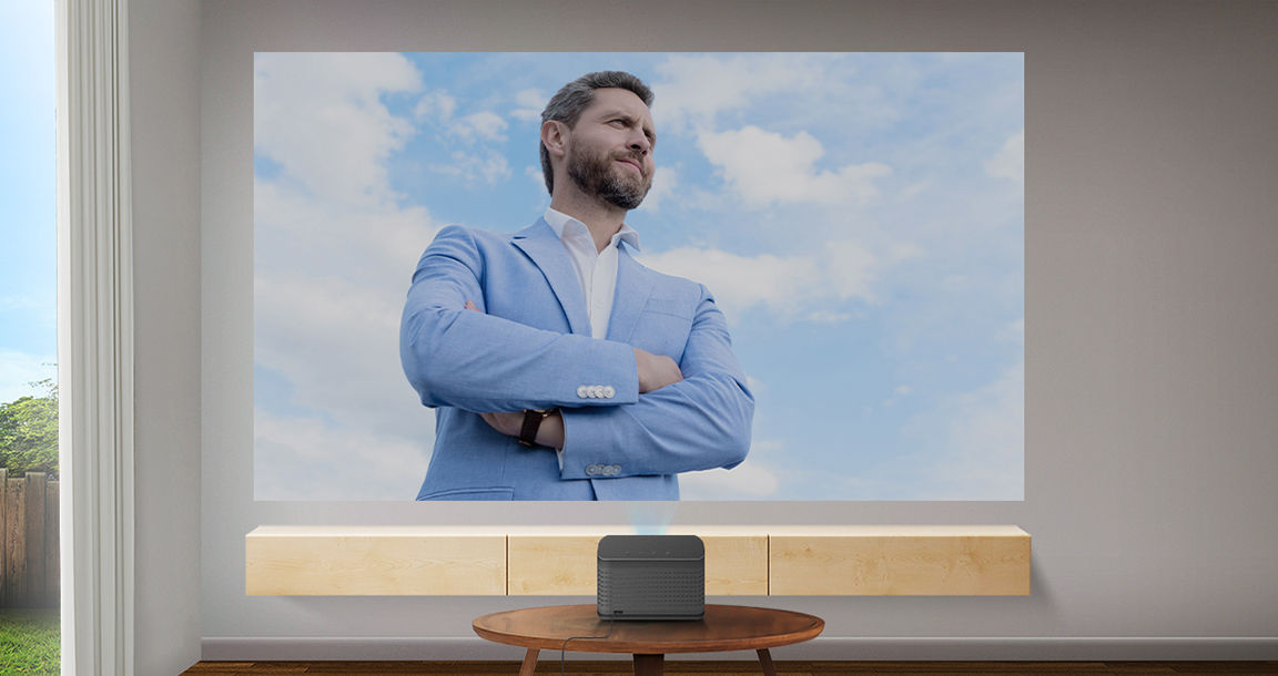 competitor projector showing loss of sky details in a brightly lit room with ambient light