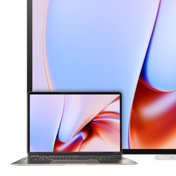 A MacBook Pro placed in front of a BenQ interactive display in M-book mode, showing perfectly matched brilliant colors for seamless creative workplace productivity.