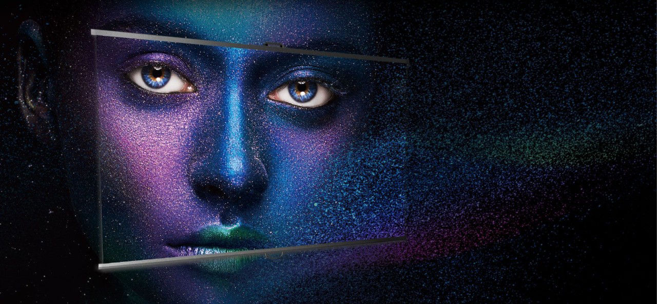 The man is looking at the high-quality image projected by BenQ projector with HDR-PRO technology.