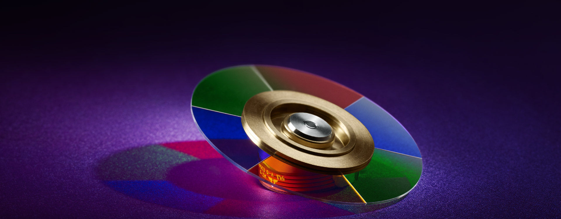 A disk is painted with nanometer-level precision pure color coating.