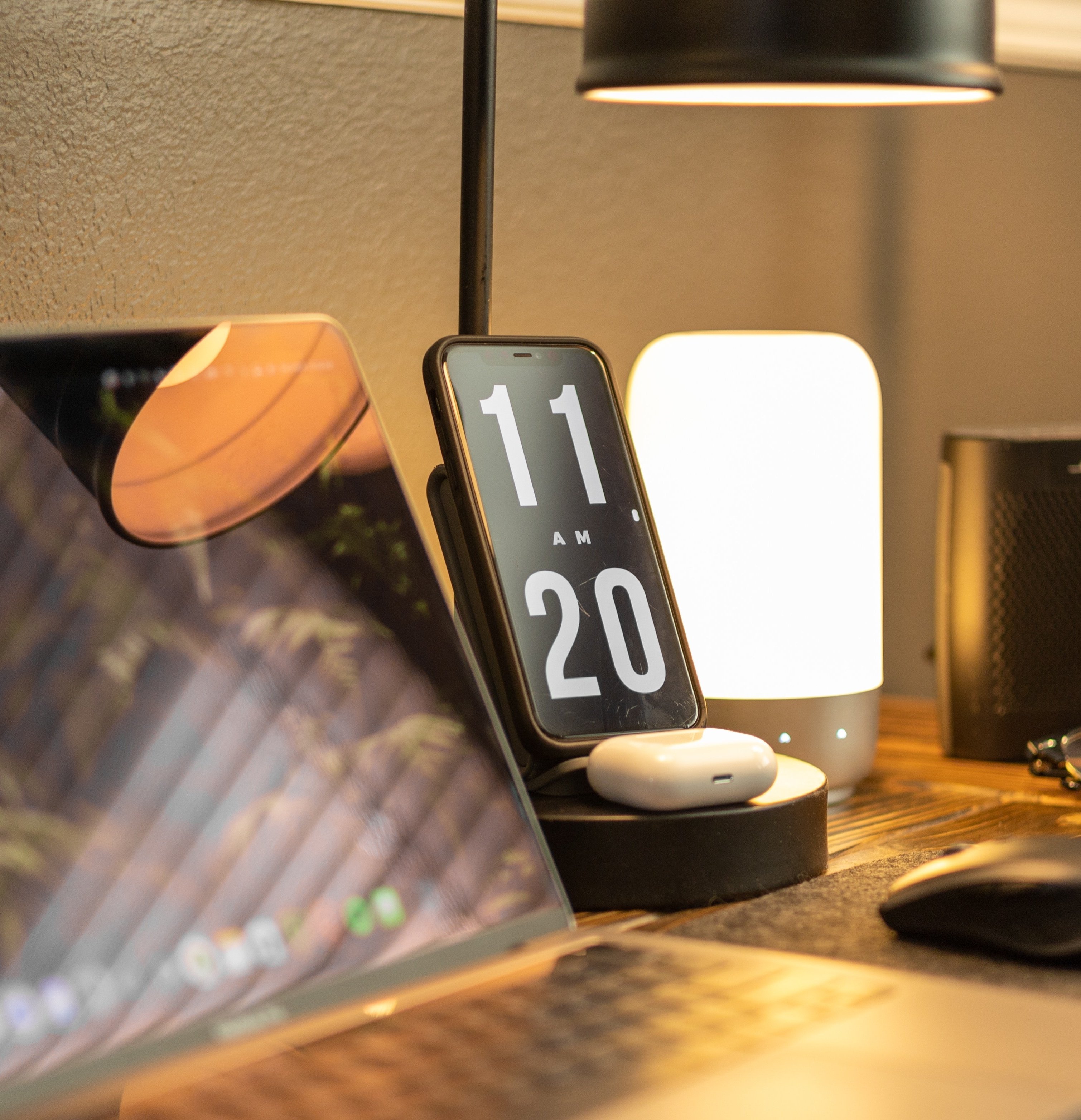 traditional desk lamp provides yellowish light with glares on the screen