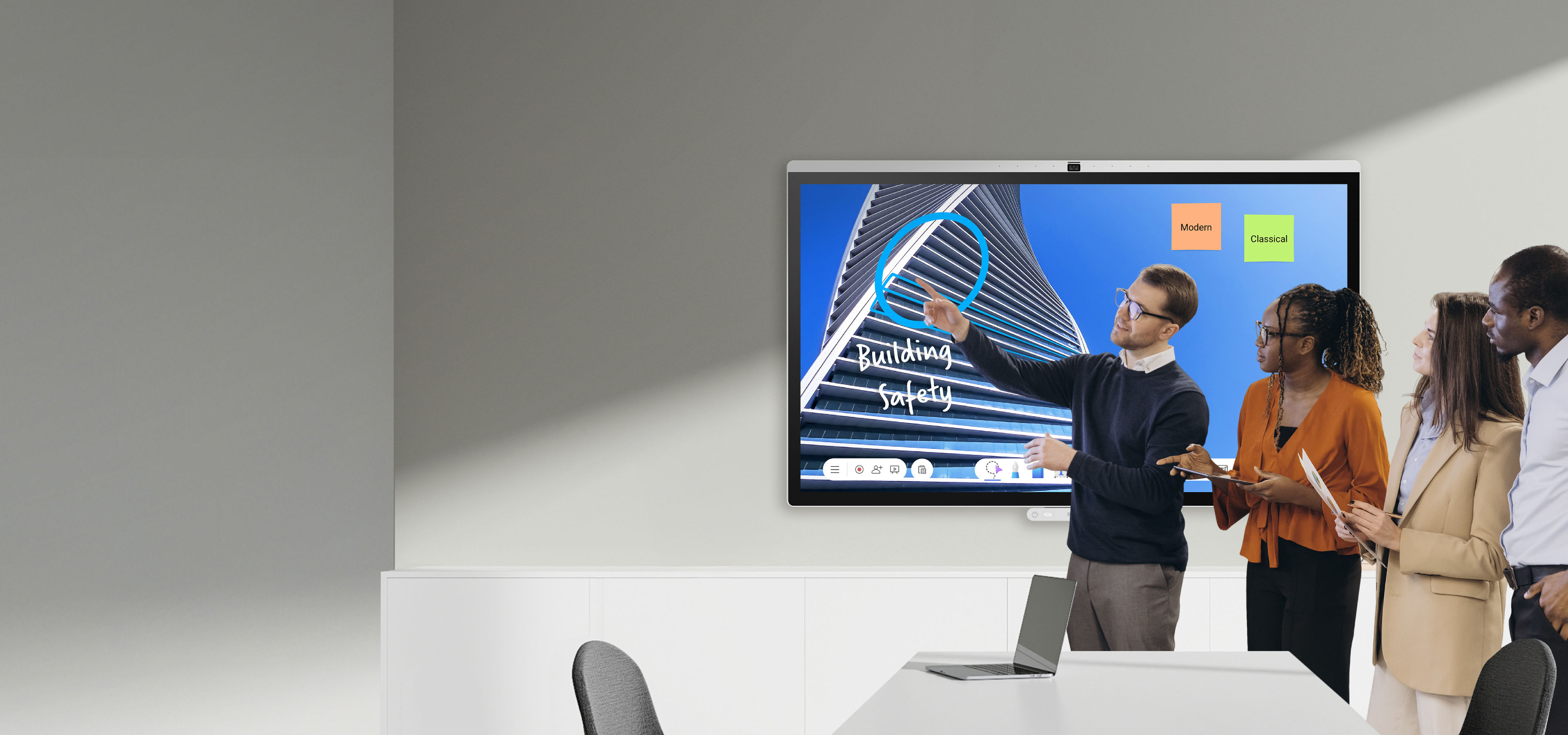 A group of professionals brainstorming on a BenQ smart board using EZWrite 6, featuring an infinite canvas and split-screen mode for dynamic team collaboration.