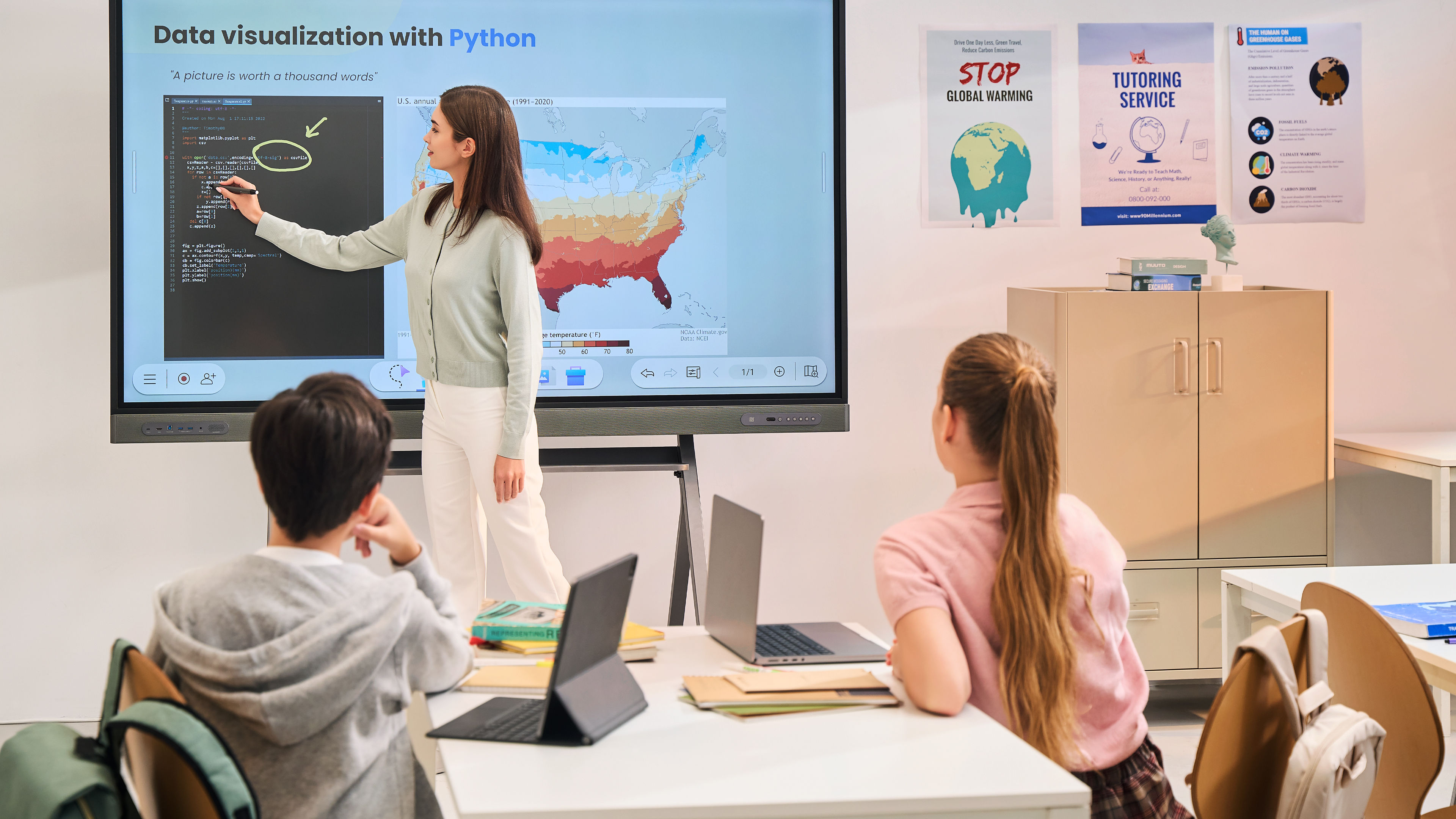 Teacher giving an engaging lesson to a group of students with an RP03 interactive display