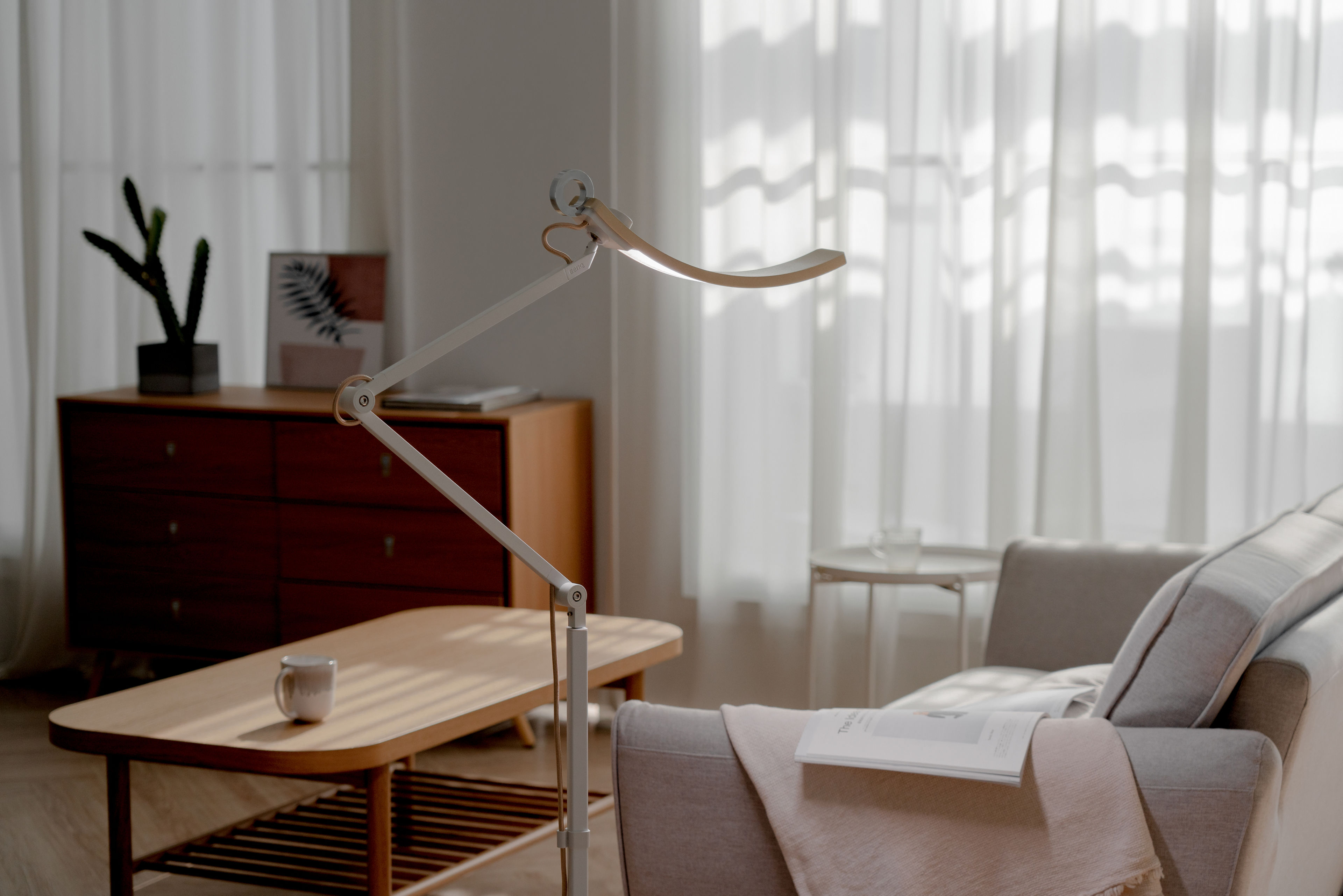 floor lamp next to sofa in a wooden style living room