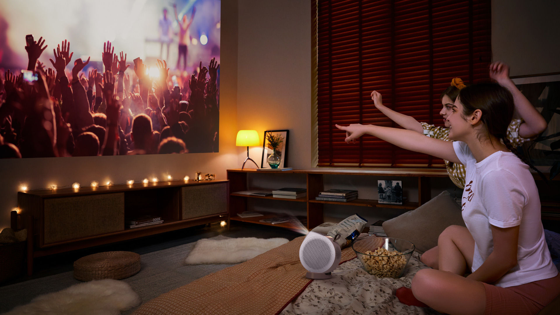 BenQ GV32 portable projector creating cozy movie nights with roommates