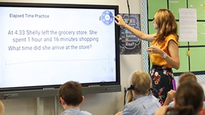 IGGS Teacher delivering class with help of BenQ interactive display