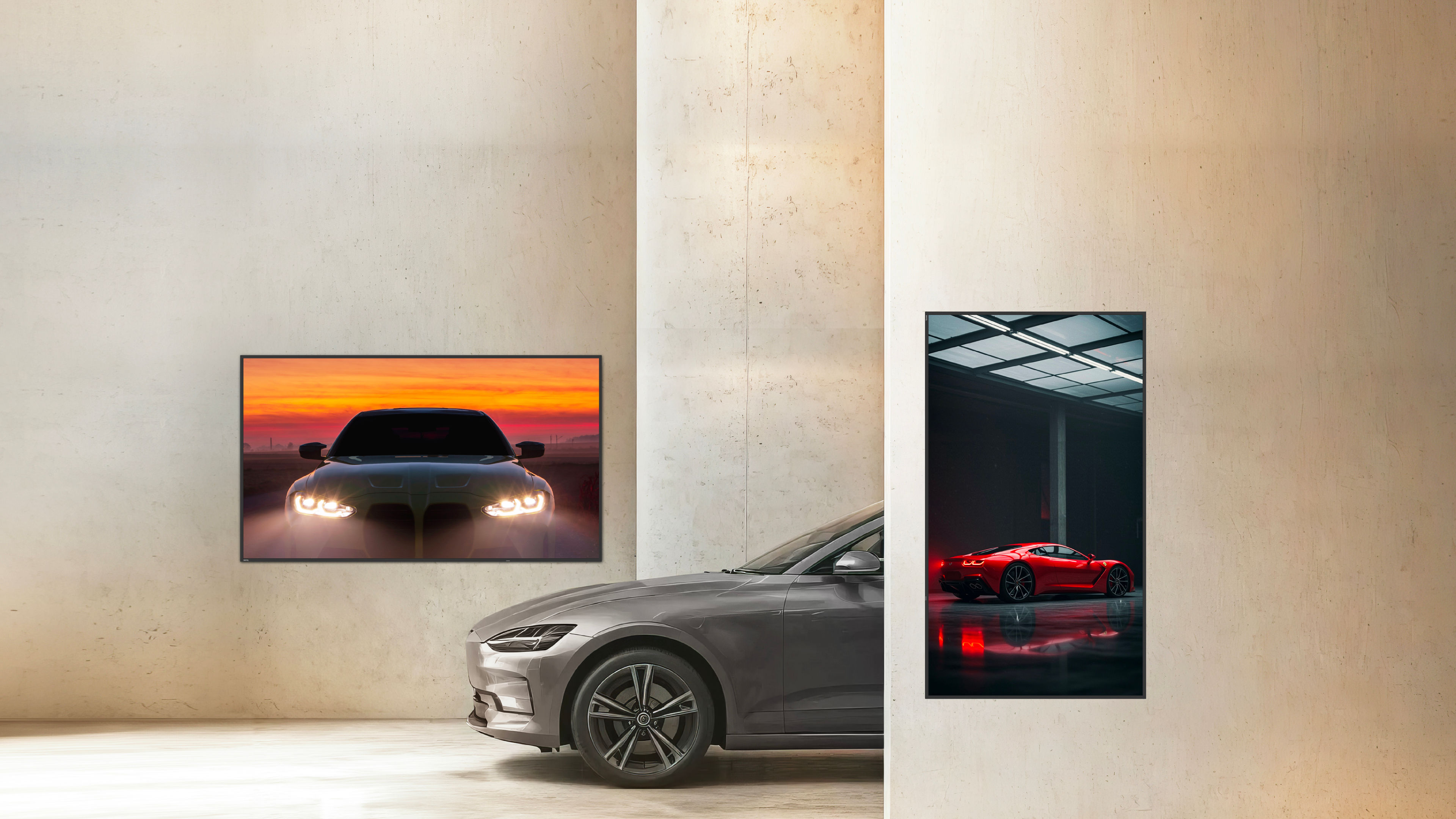 A gray car and a red sports car displayed with perfect color accuracy on BenQ digital signage, highlighting how Pantone Validated technology reproductions exactly match brand definitions on a commercial digital signage display.