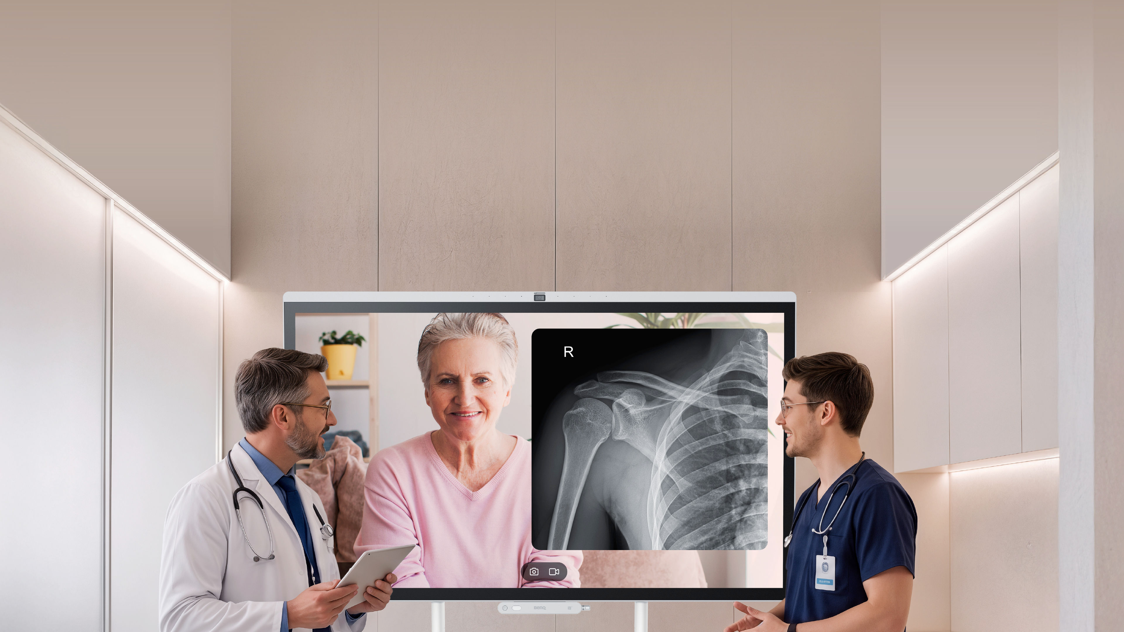 Healthcare professionals reviewing a medical image with a patient on a BenQ Board