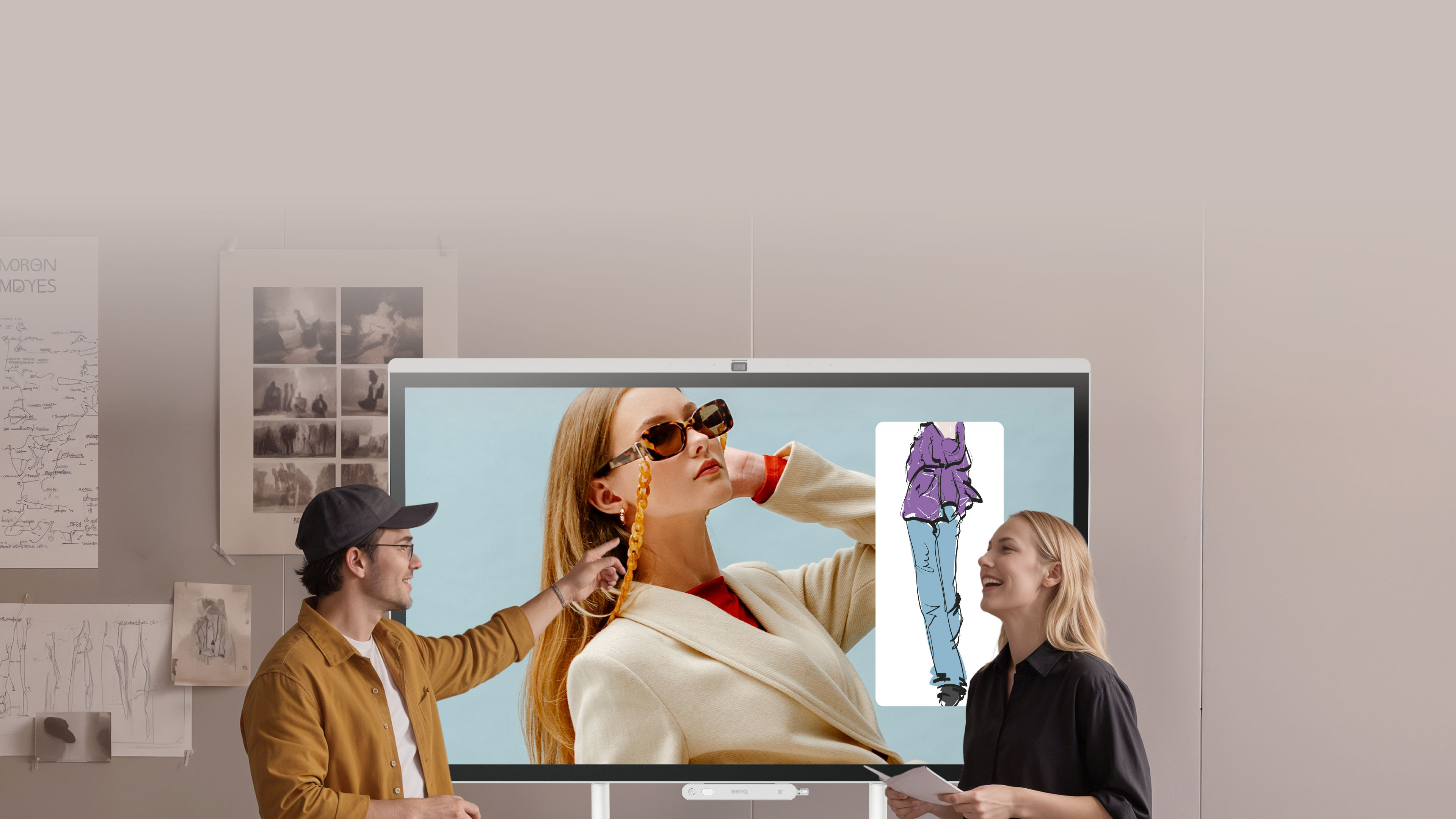 Design team reviewing fashion visuals on a BenQ Board