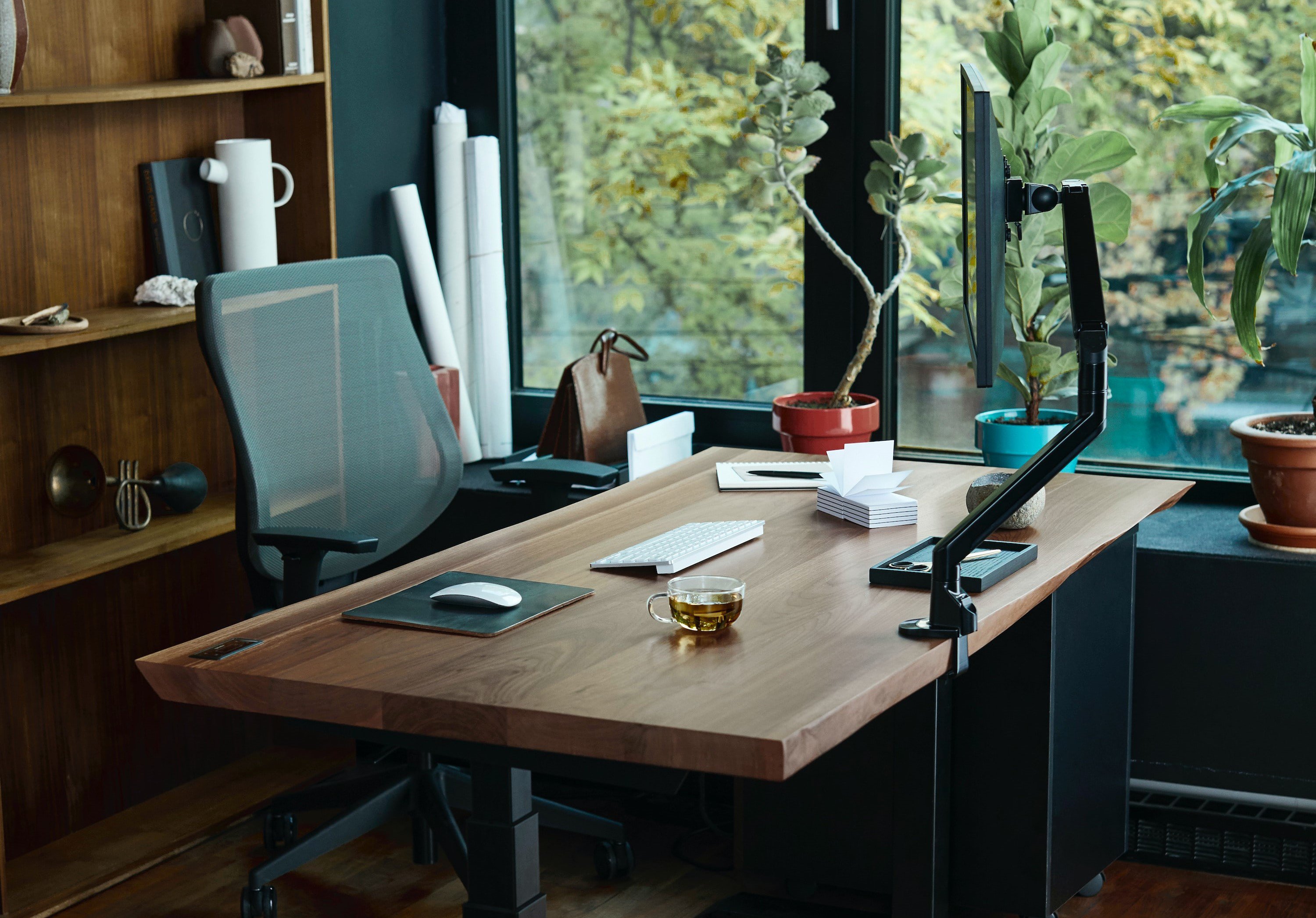 Five quick tips for improving your home office setup with lamps, ergonomic chairs, monitors, adjustable desks, and accessories. 