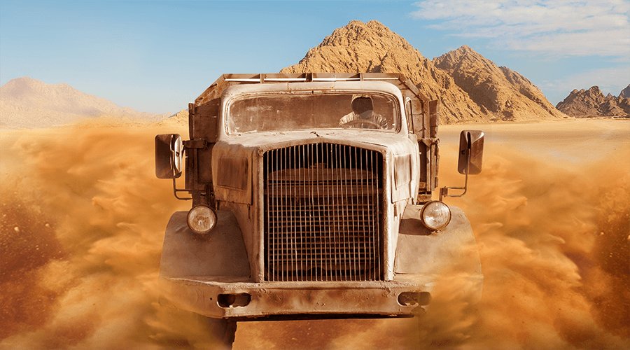 A oil truck is running in the desert like a movie scene in Mad Max Fury Road.