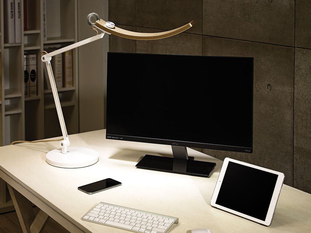 A desk lamp provides light to help you see your work more clearly and make your workspace more comfortable and efficient.