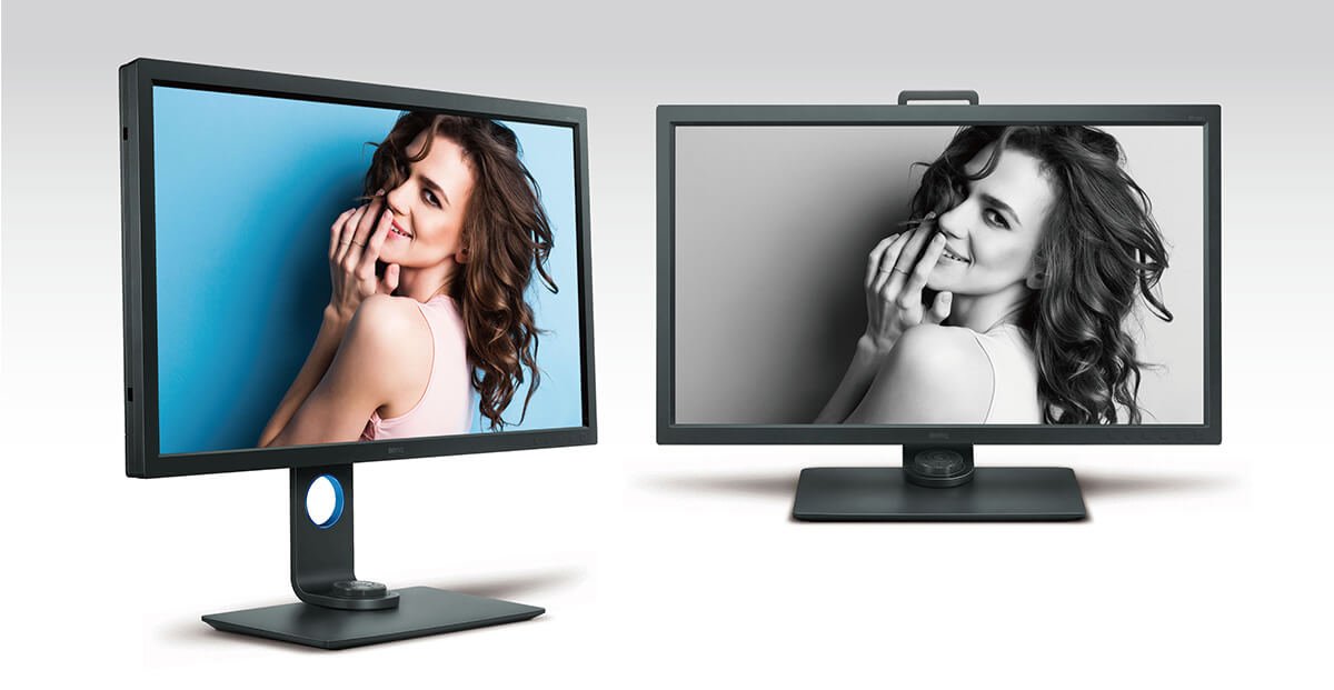 The monitor on the left shows the photo in white mode while the other monitor on the right show the photo in black mode.