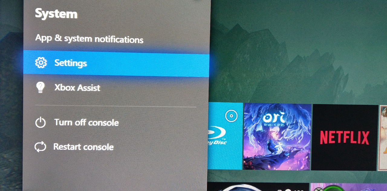 There is a Xbox button on the controller and you could go into settings.