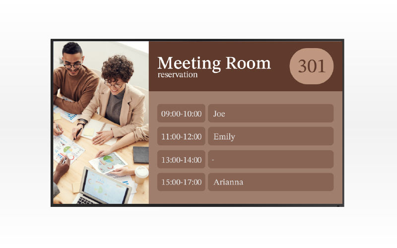 Teacher giving lesson in front of students with digital signage display showing timetable schedule