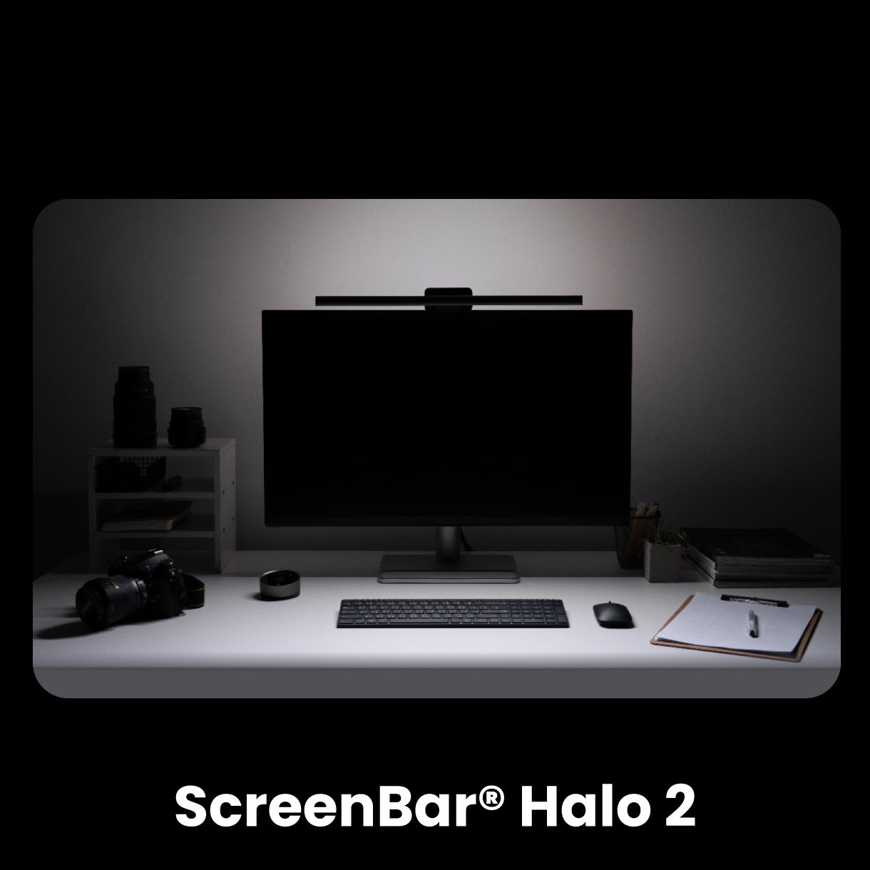 BenQ ScreenBar Halo 2 transforms a dimly lit workspace with comprehensive front and ambient backlighting, precisely controlled via a wireless digital panel for balanced, glare-free comfort.