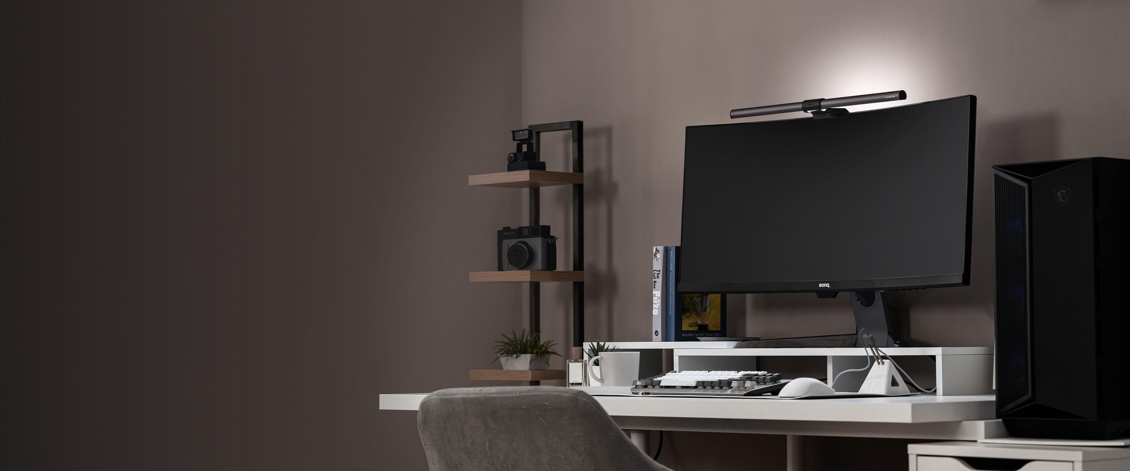 ScreenBar Halo, the world’s first monitor light bar with backlighting, designed to reduce screen–room contrast and ease eye strain in dark environments.