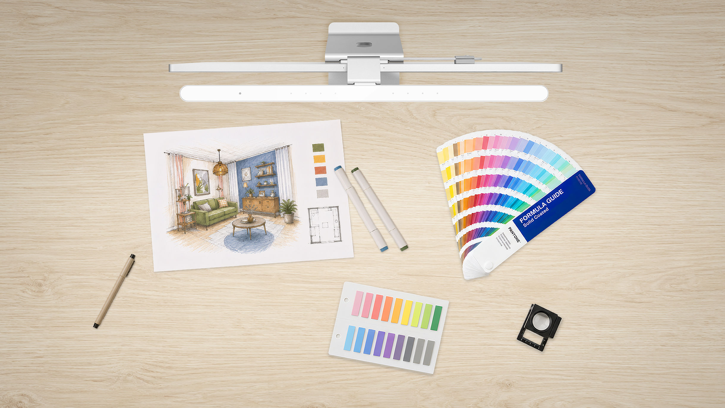 BenQ iScreenBar on iMac using full-spectrum LEDs for professional color fidelity and accurate swatch matching.