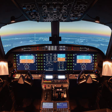 An Alsim flight simulator with BenQ’s  true-to-life projection.