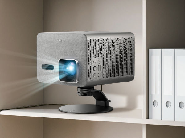 BenQ projector positioned on high bookshelf using adjustable stand for elevated projection in small spaces
