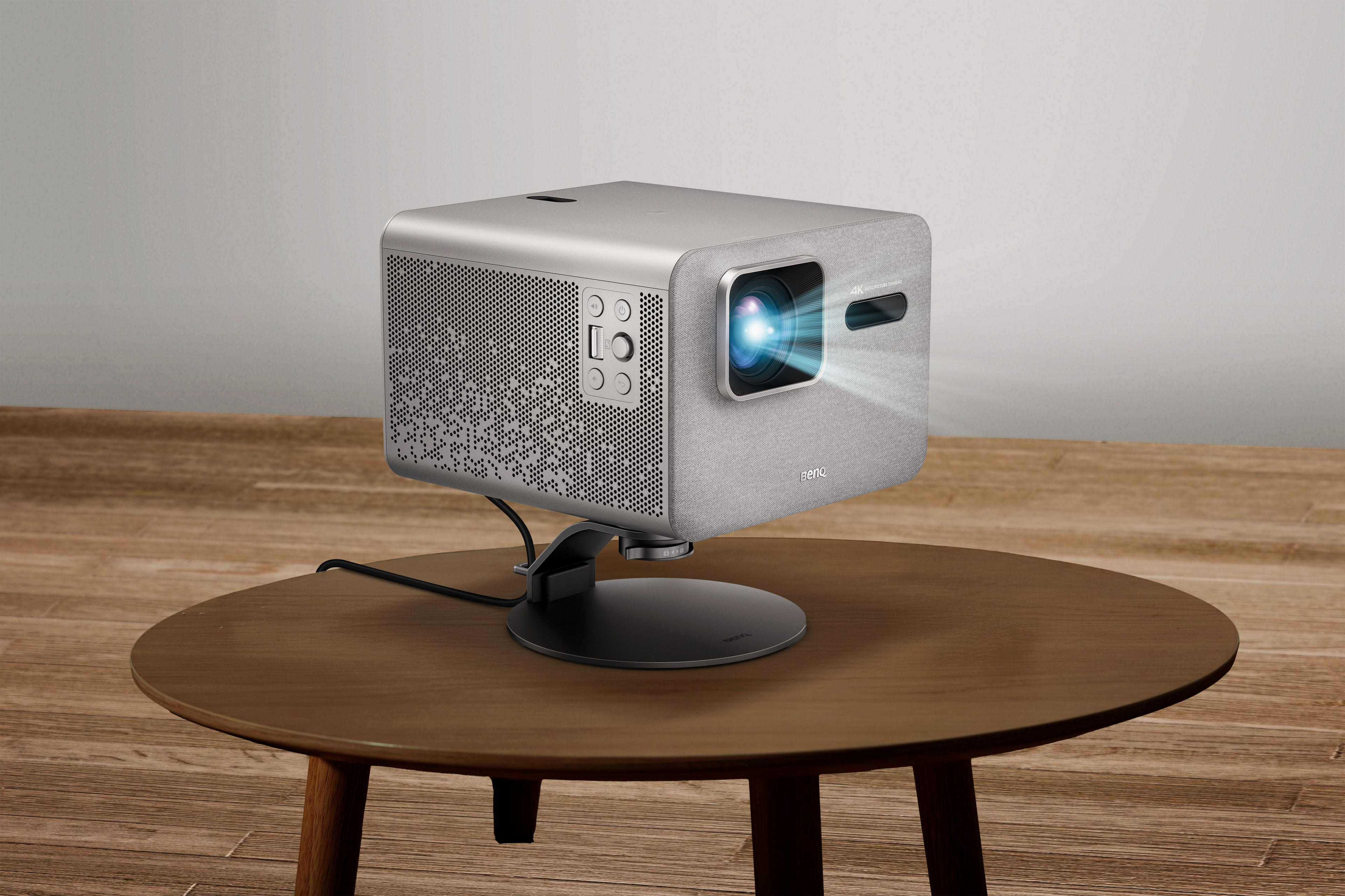 BenQ minimalist projector stand with integrated cable storage for modern home entertainment setups