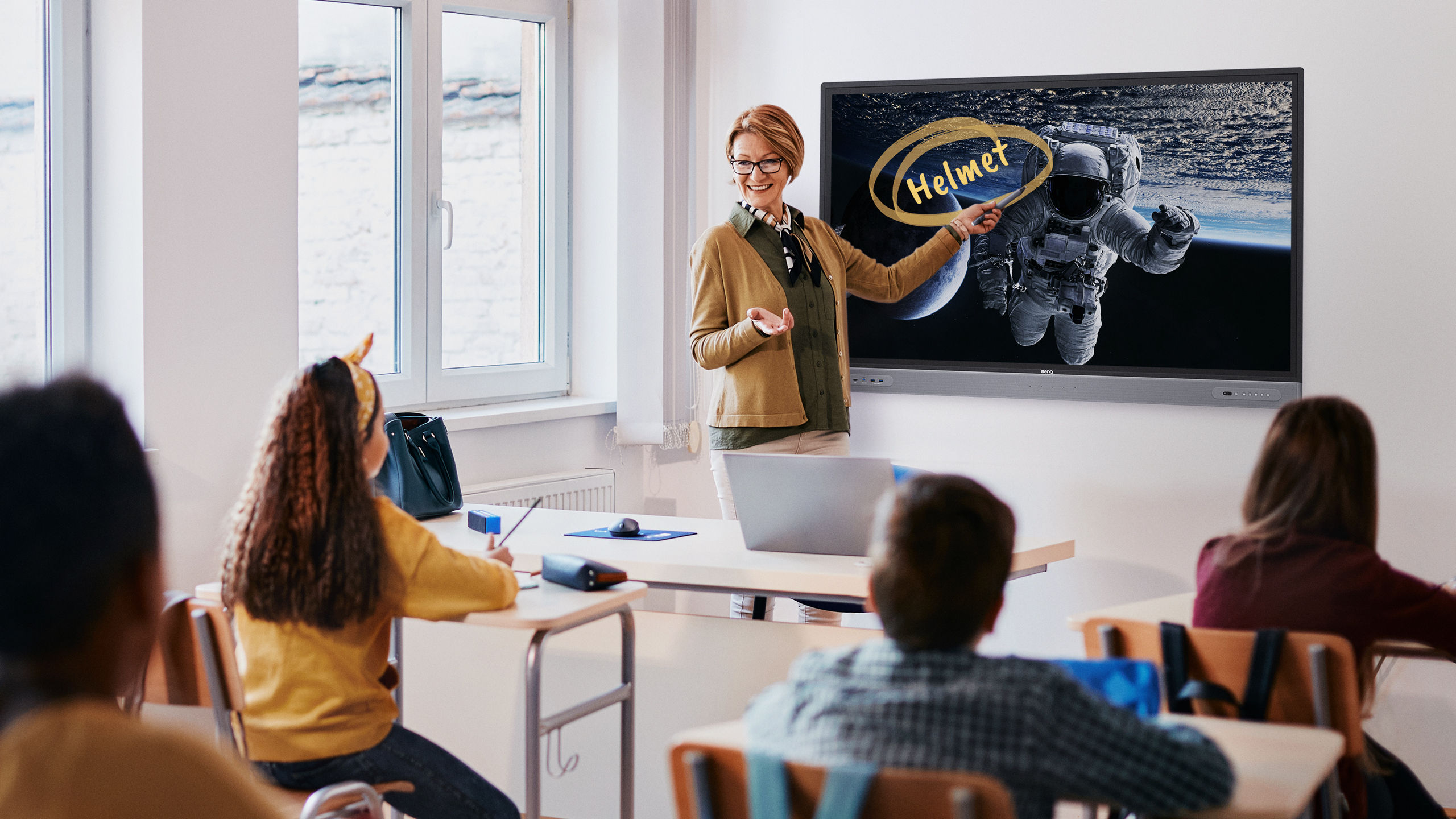 Teacher in front of BenQ teaching space exploration